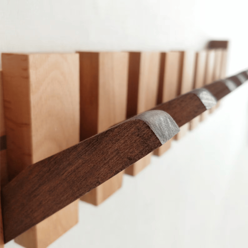 HarmonyHooks™ | Houten piano kapstok